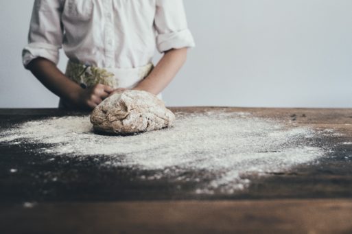 A baker making bread representation of death