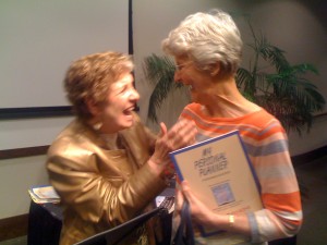 Margie with a seminar attendee