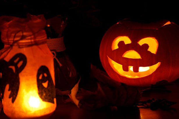 Halloween pumpkin and candle aglow