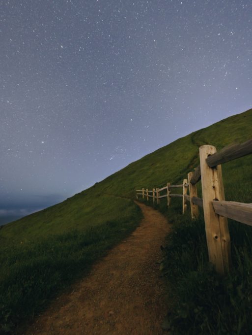 a path and fence by the stars