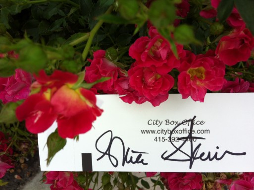 Gloria Steinem's autograph on a NPR ticket