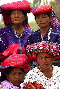 Guatemalan female mourners at a funeral for those who died in the country's civil war
