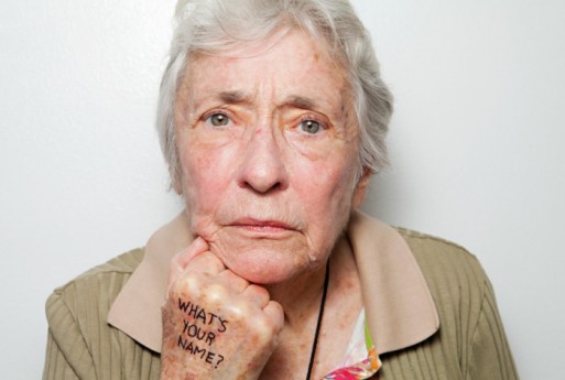 Alzeihmer's, senior citizen, fear of aging, old woman, writing on hand, memory loss