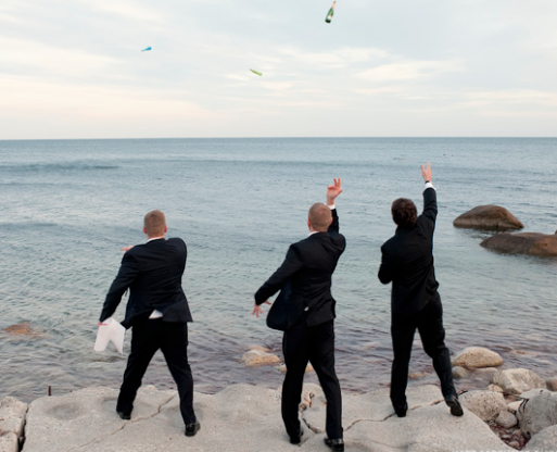 message in a bottle, wedding idea, grief, men in tuxedo, men by the sea, throwing into the sea, throwing bottle