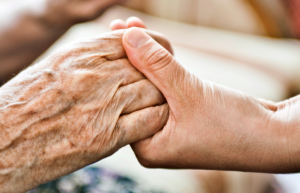 hospice care, hospice hands, elderly hands, holding hands 