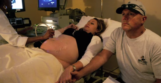The Lauxs get an ultrasound of their baby in a doctor's office