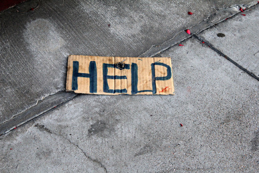 A sign that says "help" 