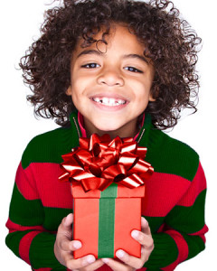 Child with christmas gift of named guardian