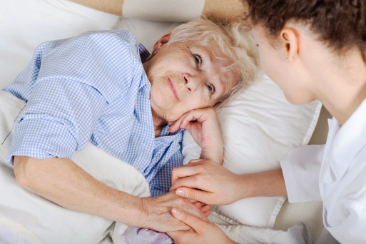 elderly women in hospice getting palliative care