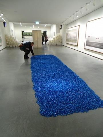 "Untitled" (Placebo) art installation featuring thousands of pieces of blue candy on the ground