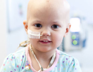 A child with leukemia in a hospital room 