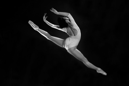 Ballerina dancing, symbolizing creativity