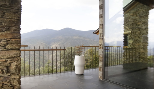 Incube on a balcony overlooking the mountains