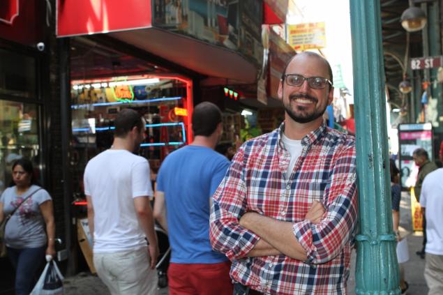 Photo of Matthew Thomas standing on a Queens, N.Y. street