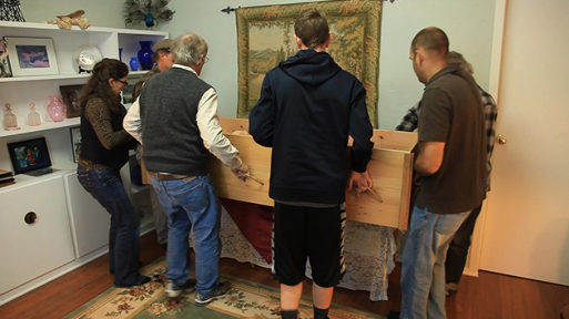 Bringing a coffin in a home for a family-directed funeral