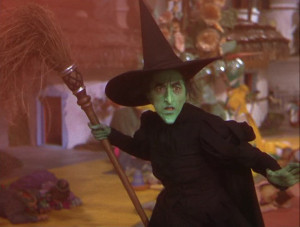 Elphaba the wicked witch with a look of shock