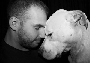 A photo of dog and his caretaker shows deep love that survives death