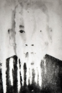 Portrait of an Asian man from his tomb, streaked and faded from time