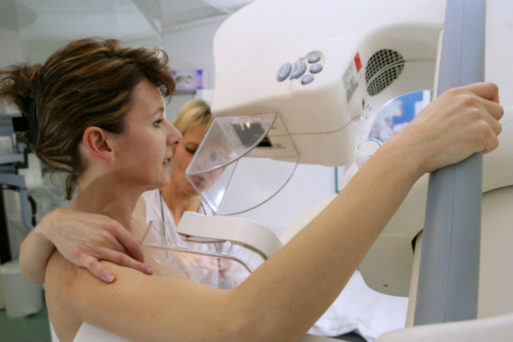Woman getting mammogram for breast cancer detection