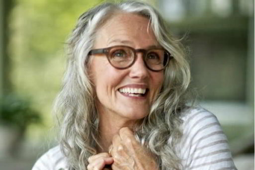 smiling older woman with wrinkles