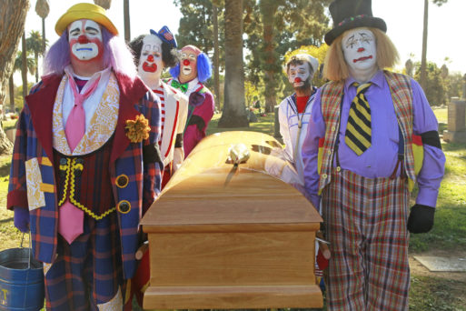 Clowns at a funeral