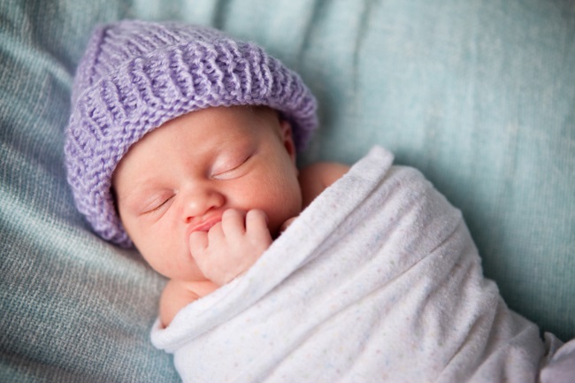 swaddled infant 