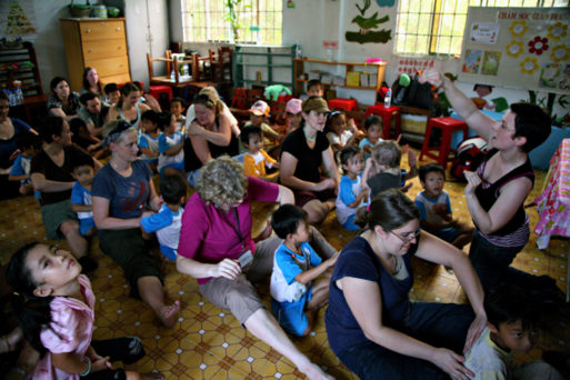 Pediatric massage being taught at an orphanage