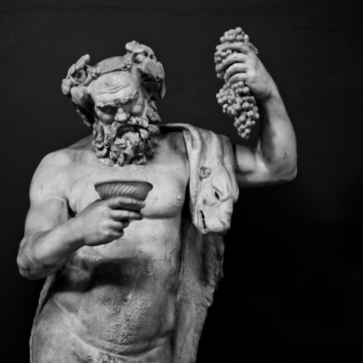 Greek statue with grapes sayings a joke about death