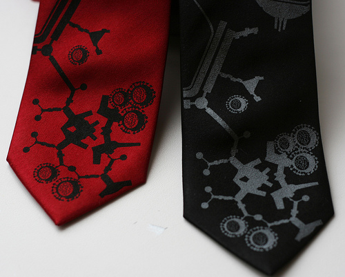 Bethany Shorb's Terminal Illnessties, featuring one red and one black tie with flu molecule designs on them