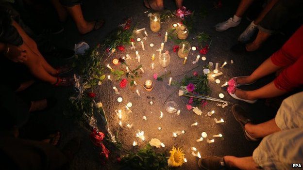 Memorial service with candles is one way a celebrant holds space for grief