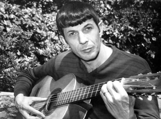 Leonard Nimoy who played Spock, playing the guitar