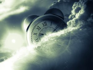 A clock in the clouds shows how time creeps by when caring for the dying: thoughts of I wish it was over are normal