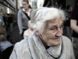 Elderly Woman looking away from camera symbolizing old age