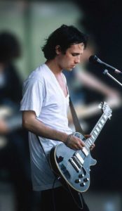 A photo of Jeff Buckley, the subject of Chris Cornell's "Wave Goodbye" playing guitar onstage