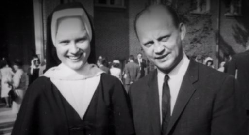 A photograph of Sister Cathy standing next to a Catholic official in the documentary "The Keepers"