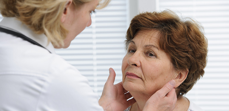 Therapist evaluates a patient for dysphagia 