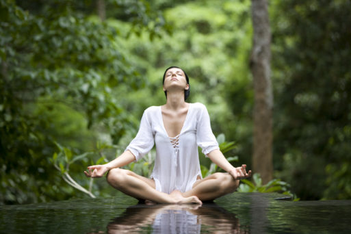 Woman breathing and meditating