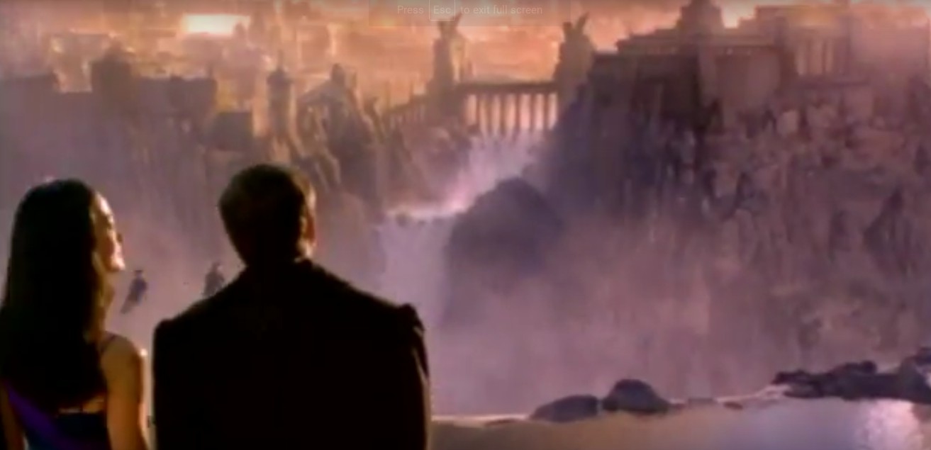 A couple from "What Dreams May Come" look at a castle in the distance