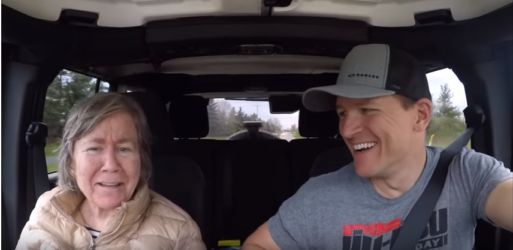 Joey sits in a car with his mother, Molly, as part of his video series showing how she's coping with dementia