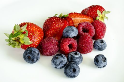 Bunch of blueberries, raspberries and strawberries symbolizing good nutrition