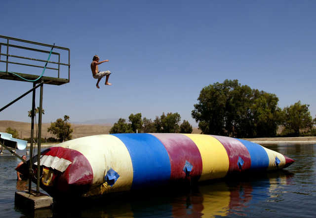 Grieving children enjoywater play at Kids Camp