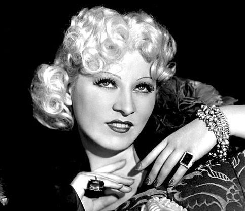 A portrait of Mae West smiling