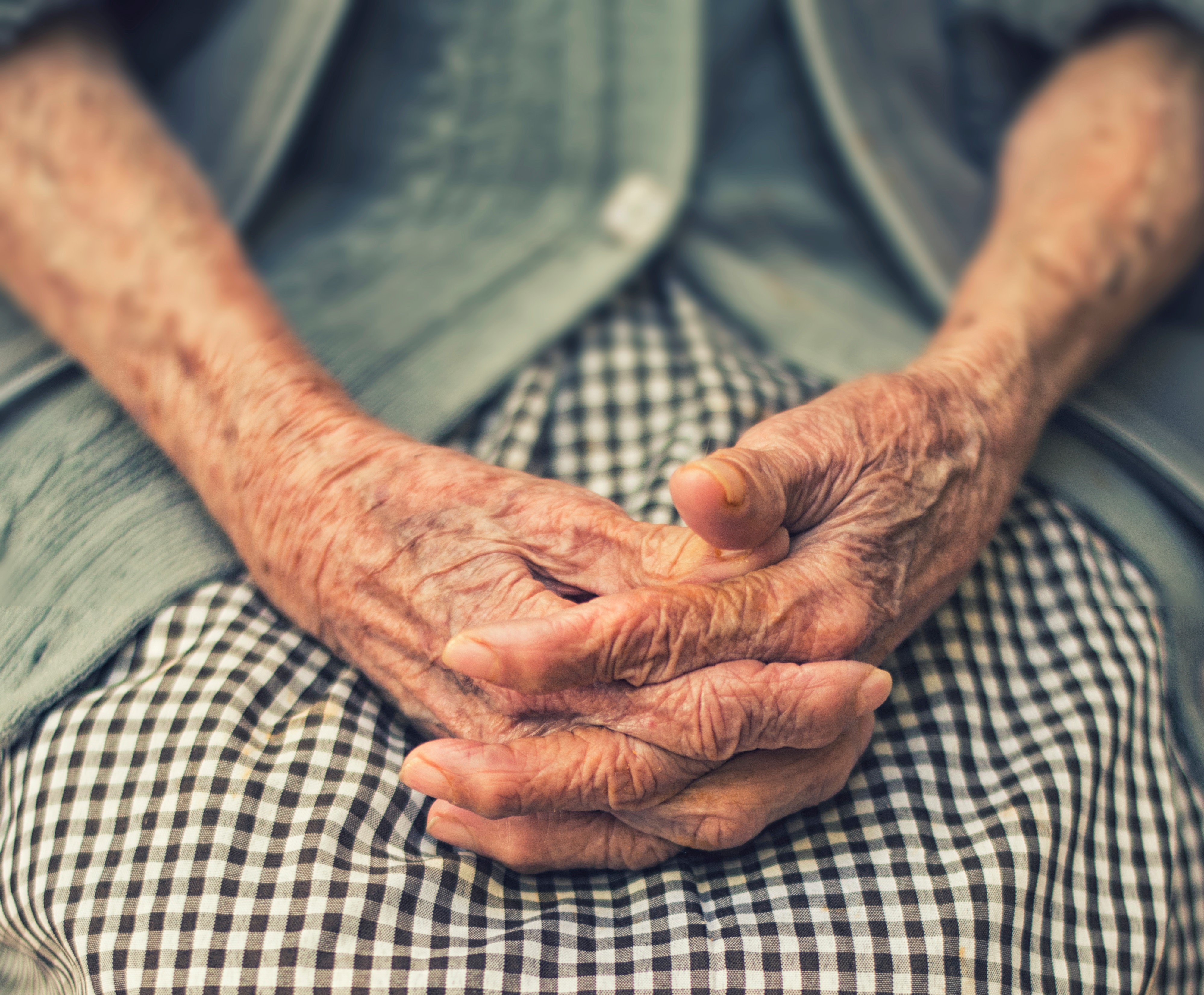 Close up of elderly woman's hands who desires death with dignity