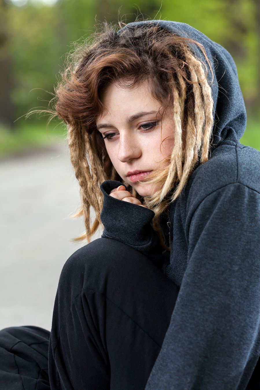 Young depressed girl needs suicide prevention help