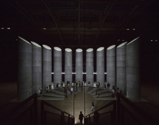 Eleven concrete towers sit in a semicircle as part of the installation art piece “An Occupation of Loss” 