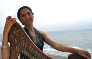 Portia Diwa plays healing harp music