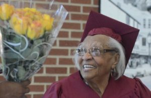 Elderly woman gets her H.S. diploma illustrates "The End of Old Age"