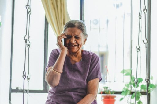 Image of elderly woman laughing 