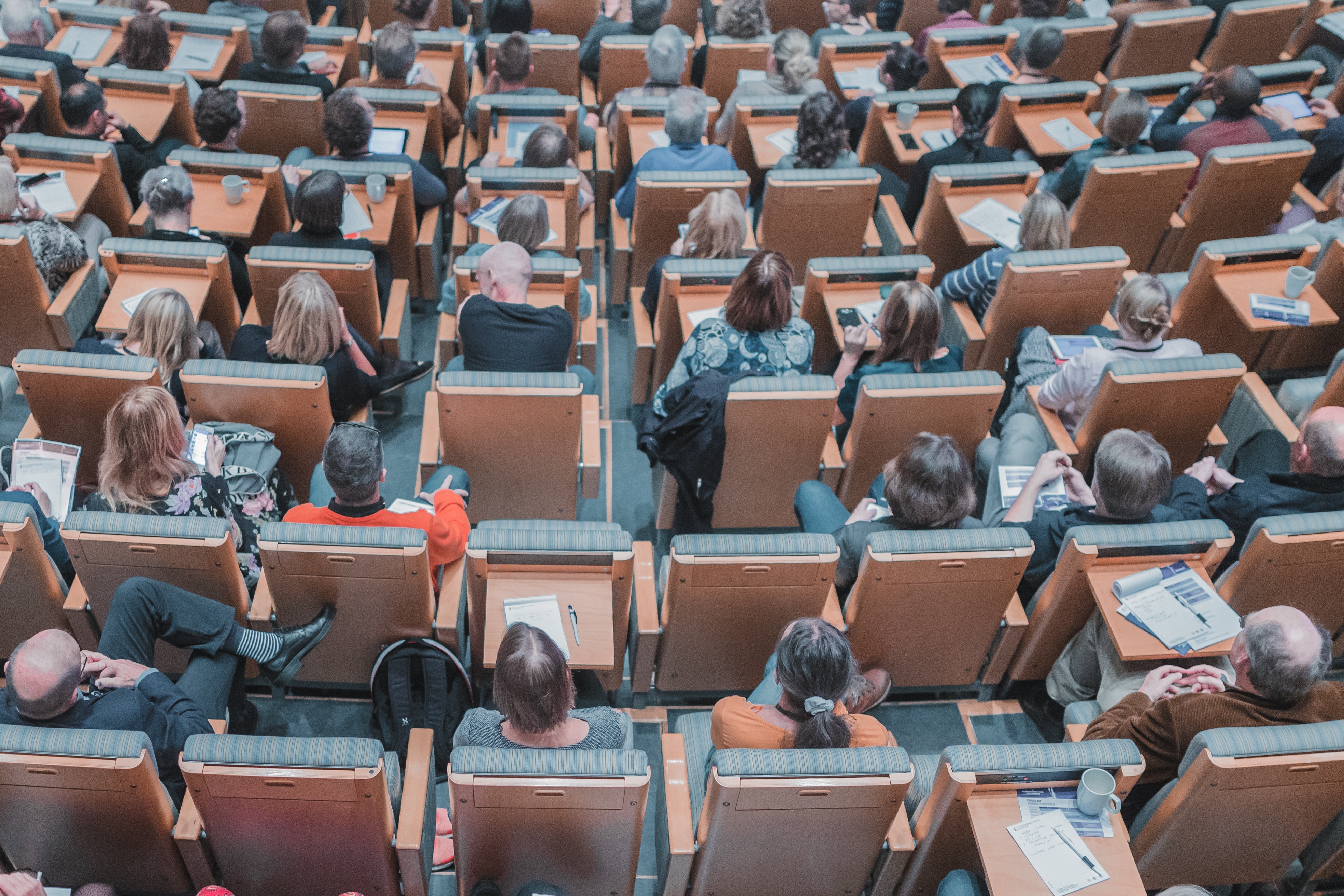 A top down image of a people in a classroom as part of active aging
