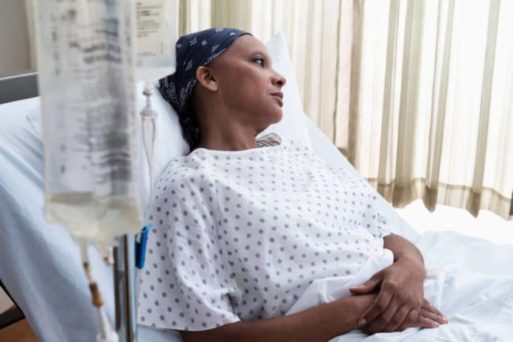 Woman with early-stage breast cancer getting chemotherapy